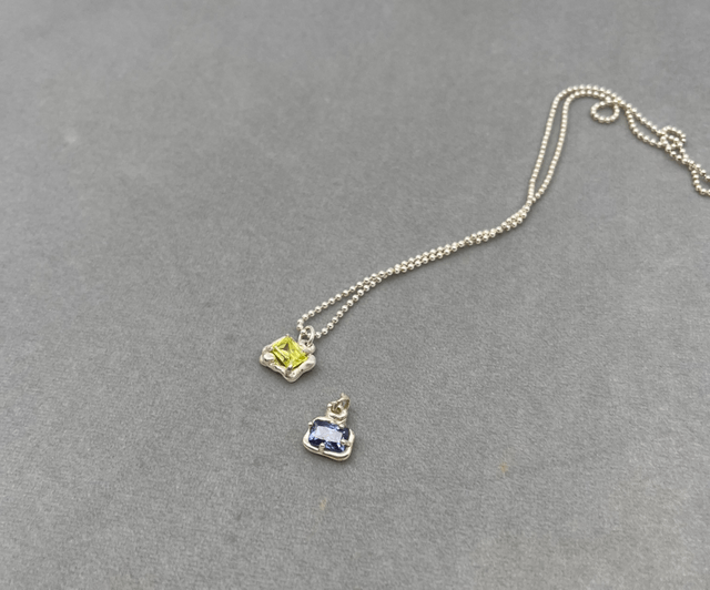 Superhero pendants