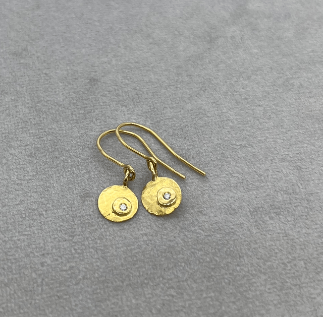 18kt gold earrings with 1,5mm VS diamond
