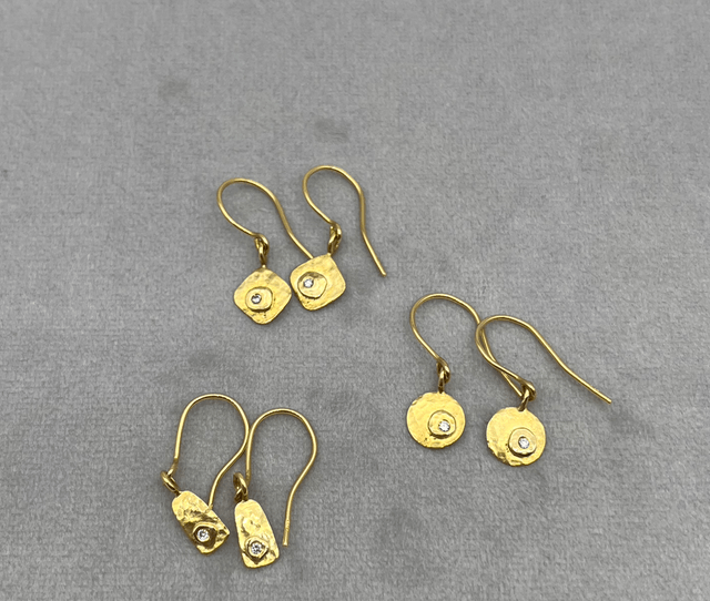 18kt gold earrings with 1,5mm VS diamond