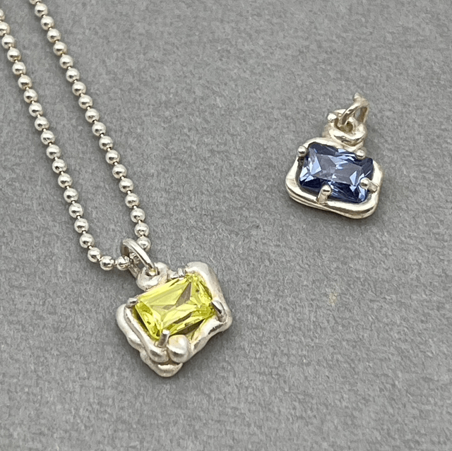 Superhero pendants
