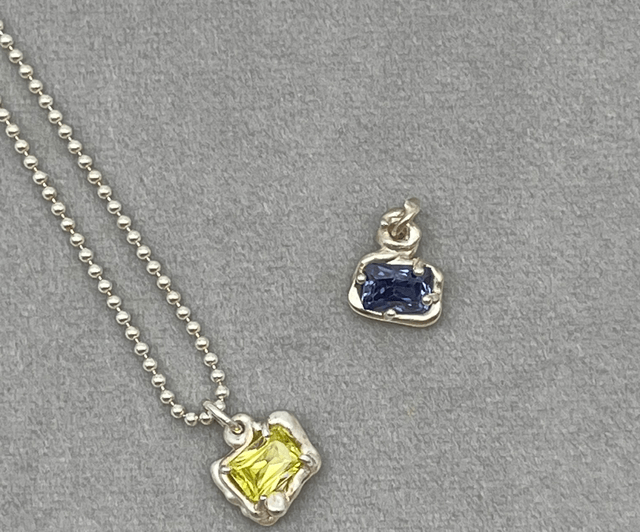 Superhero pendants