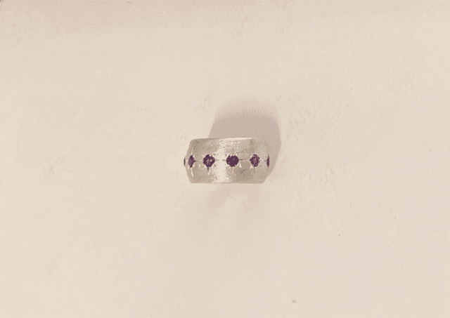 Anello argento fascia zirconi viola